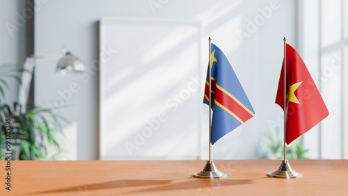 FLAGS OF CONGO DEMOCRATIC REPUBLIC AND VIETNAM ON TABLE photo