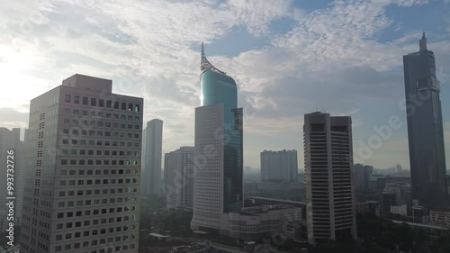 4k aerial building in Jakarta. a drone flew over the Jakarta skyline, showing the rows of tall buildings that dominate the capital's skyline.