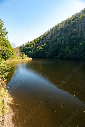 Rur in der Nähe der Rurtalsperre Schwammenauel beim Wasserkraftwerk Heimbach in der Eifel im Sommer bei schönem Wetter photo