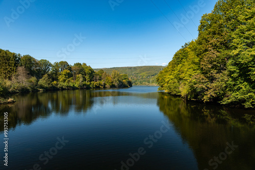 Rur in der Nähe der Rurtalsperre Schwammenauel beim Wasserkraftwerk Heimbach in der Eifel im Sommer bei schönem Wetter photo