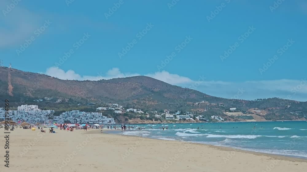 Tetouan, Morocco - 20 August 2024, view of people swimming and enjoying vacation in Cabo Negro, also known as Cabo Negro Beach and Golf Resort is a beach resort in northern Morocco Tetouan, Morocco - 20 August 2024, view of people swimming and enjoying vacation in Cabo Negro, also known as Cabo Negro Beach and Golf Resort is a beach resort in northern Morocco