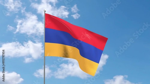 The Armenian National Flag flutters in the blue sky. photo