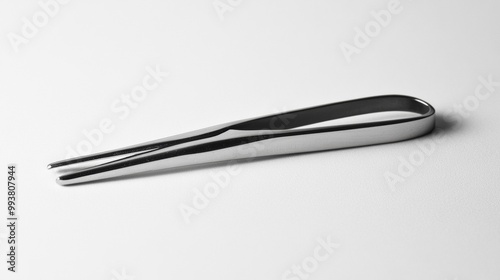 A pair of tweezers is shown against a plain white backdrop.