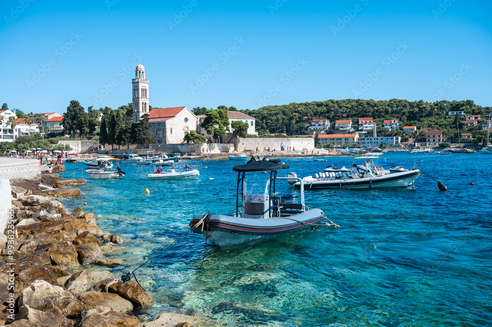 Hvar town with boats in the harbor, Croatia.