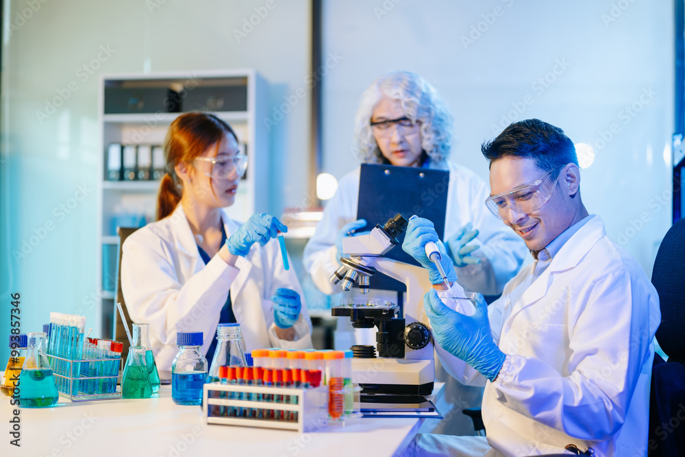 Scientist team meeting and writing analysis results in the laboratory study Scientist team meeting and writing analysis results in the laboratory study