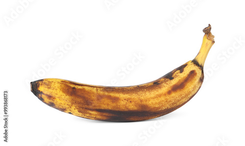 Overripe banana with dark spots isolated on white