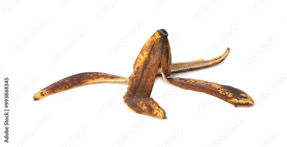 Banana peel with dark spots isolated on white Banana peel with dark spots isolated on white
