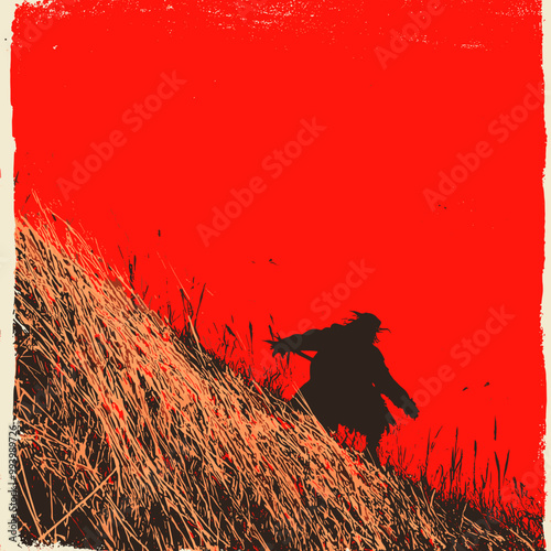 Silhouette of a lone figure walking up a hill with a bright red sky in the background