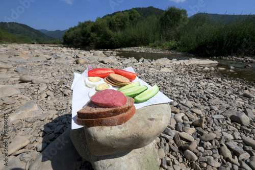 tourist lunch improvisation on the stone photo