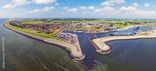 Foto Aerial panorama from the historical town Oudeschild on Texel island in the Nethe