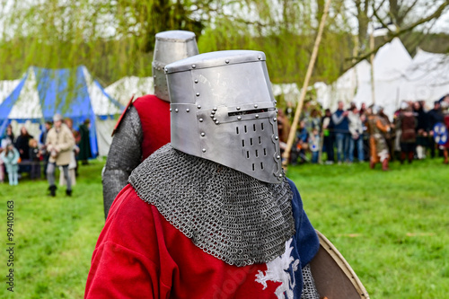 Knight fight, show fight of disguised knights and warriors, medieval soldiers with swords and shields at medieval market in Graefenthal Monastery, Goch, Kleve, North Rhine-Westphalia