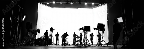 A crew working behind the scenes on a film set