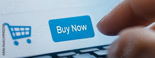 Close up shot of a person s hand clicking the  Buy Now  button on an e commerce website showcasing the ease and accessibility of online shopping for consumers photo