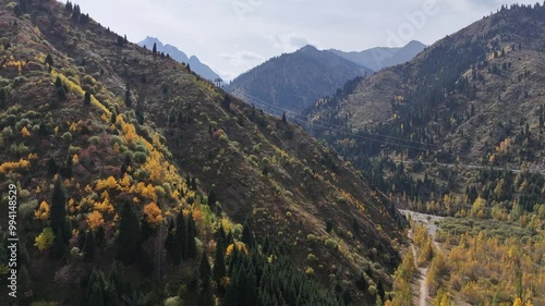 A picturesque mountain gorge above the Medeu skating rink in the vicinity of the Kazakh city of Almaty on an autumn day photo