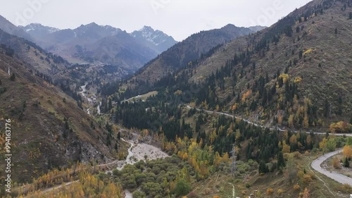 A picturesque mountain gorge above the Medeu skating rink in the vicinity of the Kazakh city of Almaty on an autumn day photo