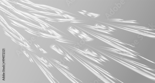 Glare from the sun's rays on the wall. Blurred shadows in the room. Soft overlay of natural light. Abstract background for product presentation.Natural light layout.