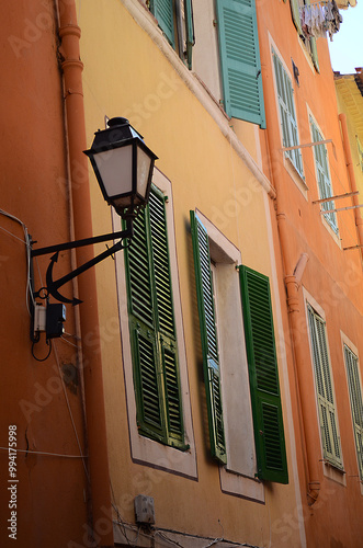 street lamp, building facade and shutters french style