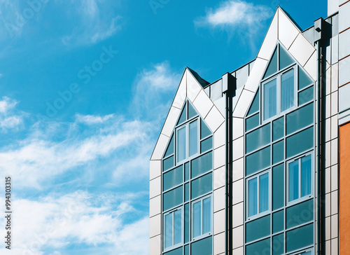 modern buildings modelled on old tenements against a sky background  photo