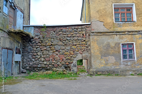 Fragment of the old fortress wall of Valdava Castle. Nizovye village, Kaliningrad region photo