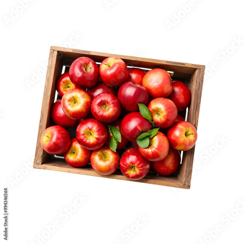 A top-down view of a wooden crate filled with vibrant red apples, some with green leaves, neatly arranged.