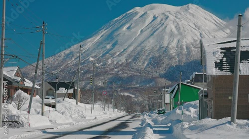 Snowfall in the Japanese town of Niseko with Mount Yotei behind