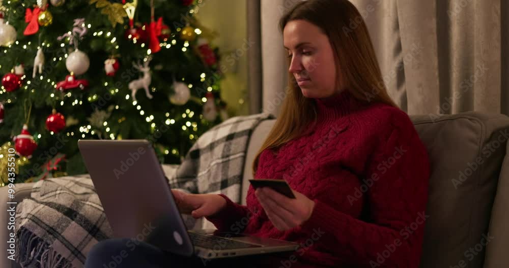 Woman shopping online during Christmas holiday Woman shopping online during Christmas holiday