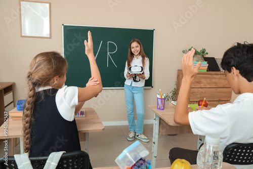 Teenage girl with VR glasse...
