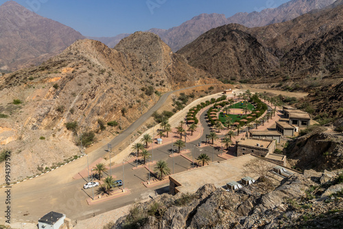 Park and a parking lot in Thee Ain ( Dhi Ayn) village, Saudi Arabia photo