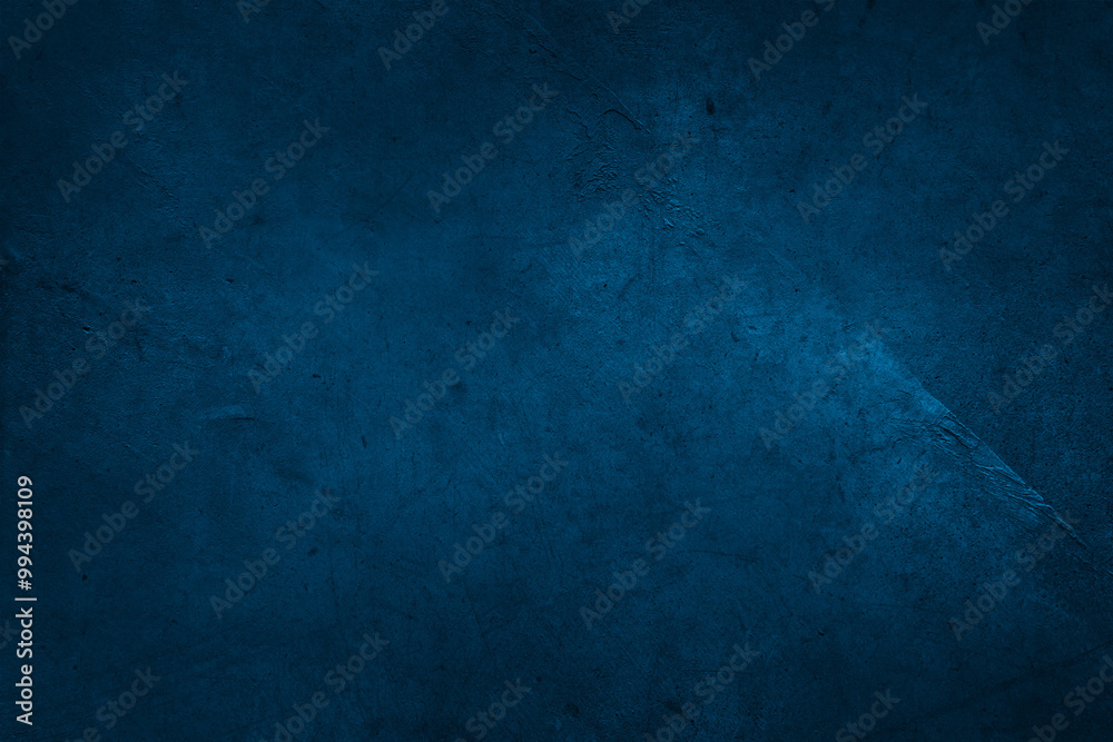 Fototapeta premium Blue textured concrete wall dark background