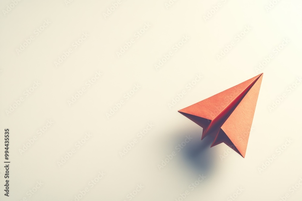 Simple Red Paper Airplane on White Background Simple Red Paper Airplane on White Background