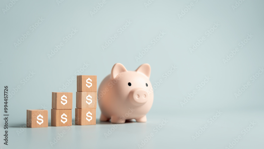 wealth, fund, piggybank, future, horizontal, invest, investor, mortgage, planning, profit. A piggy bank with a stack of wooden blocks on top of it. The blocks are labeled with the amount of money. wealth, fund, piggybank, future, horizontal, invest, investor, mortgage, planning, profit. A piggy bank with a stack of wooden blocks on top of it. The blocks are labeled with the amount of money.