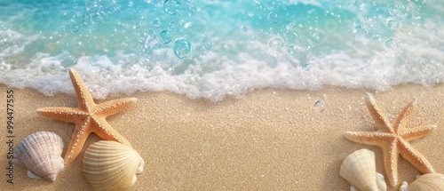 Seashells and a starfish on sandy beach with gentle waves and bubbles under t...