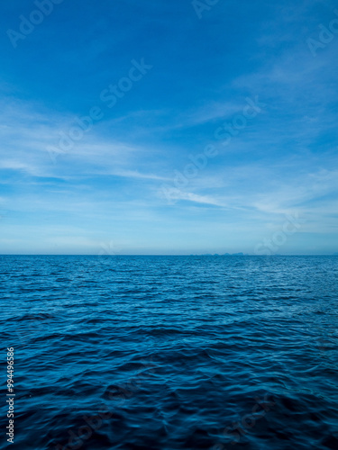 Landscape beautiful summer season vertical horizon look view tropical shore open sea cloud clean blue sky background calm nature ocean wave water nobody travel at Koh Muk Trang Thailand sun day time