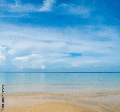 Beautiful horizon Landscape summer vertical front view point tropical sea beach white sand clean blue sky background calm nature ocean andaman wave water travel at Koh Muk Trang Thailand sun day time