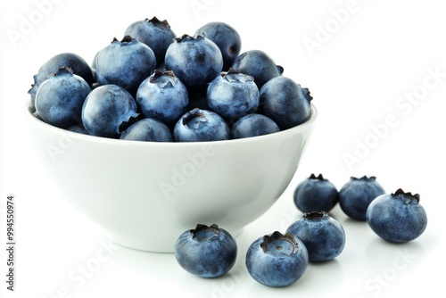 On a marble background, ripe blueberries are displayed