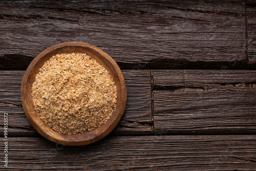 Soy fiber based powdered food in the bowl - Rustic wooden background photo