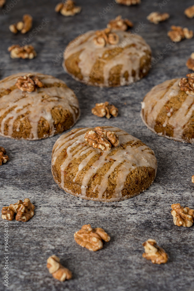 Fototapeta premium Homemade cookies with walnuts on a gray background