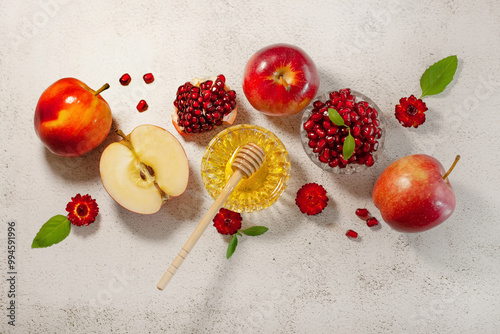 Rosh Hashanah is a Jew New Year. Apple, honey, pomegranate for the festive table. Happy Rosh Hashanah. Shana Tova photo