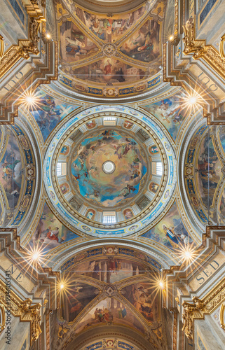 VOGHERA, ITALY - SEPTEMBER 12, 2024: The cupola of  Domo - Collegiata di San Lorenzo by Luigi Morgari and Rodolfo Gambini (1906 - 1908).