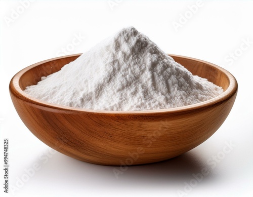 White powder in a wooden bowl, isolated on a white background.