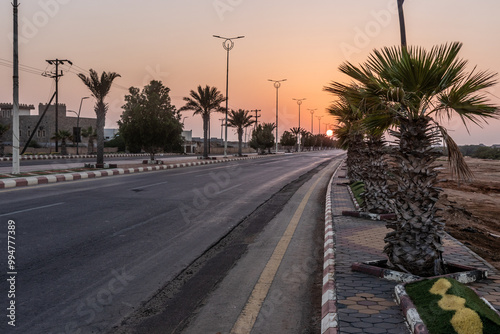 Sunset over a road on Farasan island, Saudi Arabia photo