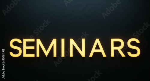 seminars word lettering with yellow glow on plain black dark background