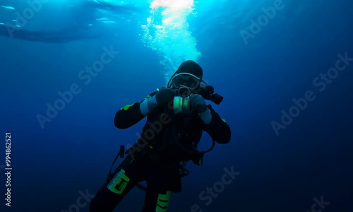 Wallpaper Mural Preparing to Explore: Scuba Diver Readies for the Ocean Torontodigital.ca