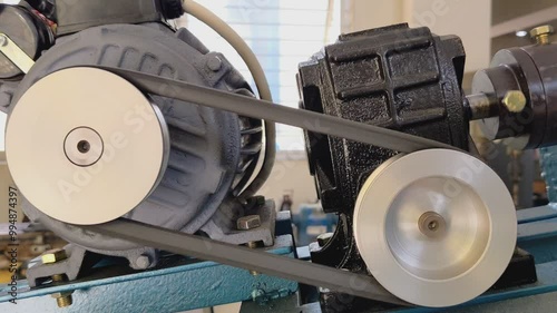 A pulley and belt system is a mechanical transmission system used to transfer power from one shaft to another.