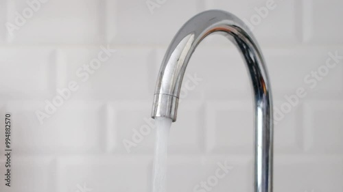 water flowing from the tap