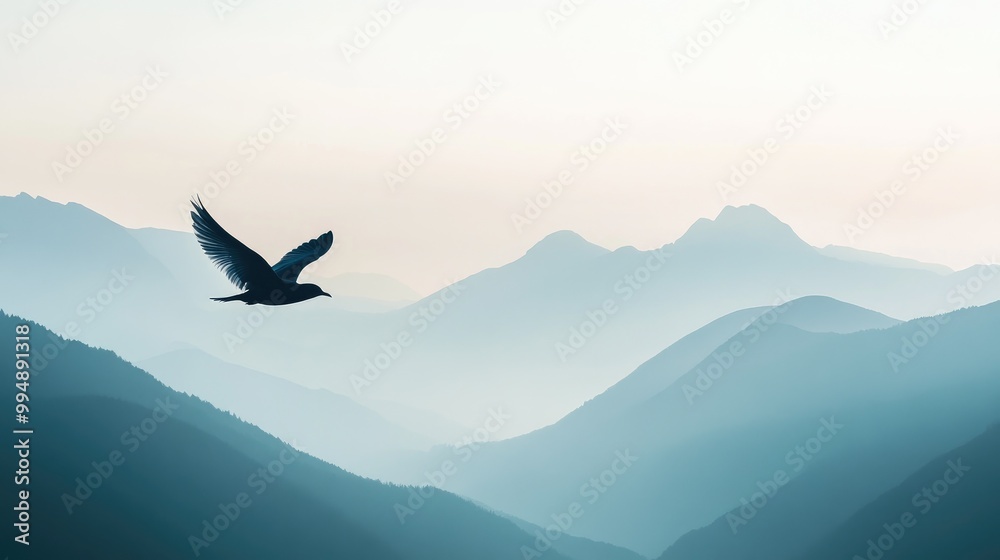A serene lake surrounded by mountains seen from above, emphasizing the peacefulness of flying. A serene lake surrounded by mountains seen from above, emphasizing the peacefulness of flying.