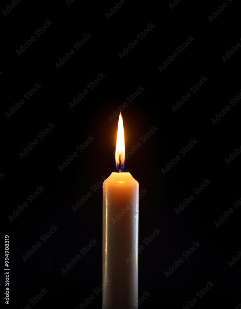 Single candle flame in dark Single candle flame in dark