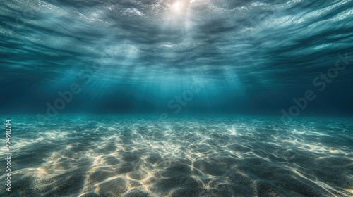 Ocean Sunlight: Underwater View with Seabed and Rays