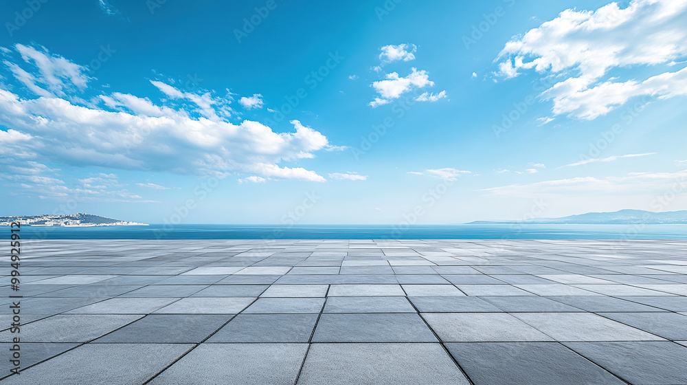 An empty square SLATE pavement with a blue sky as the background An empty square SLATE pavement with a blue sky as the background