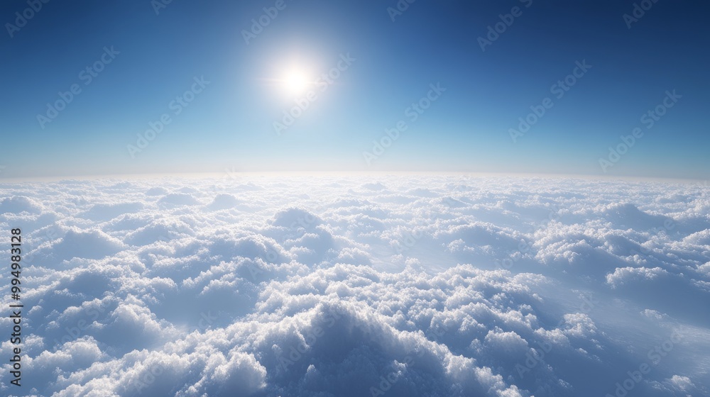 Naklejka premium Above the clouds, with a vibrant blue sky